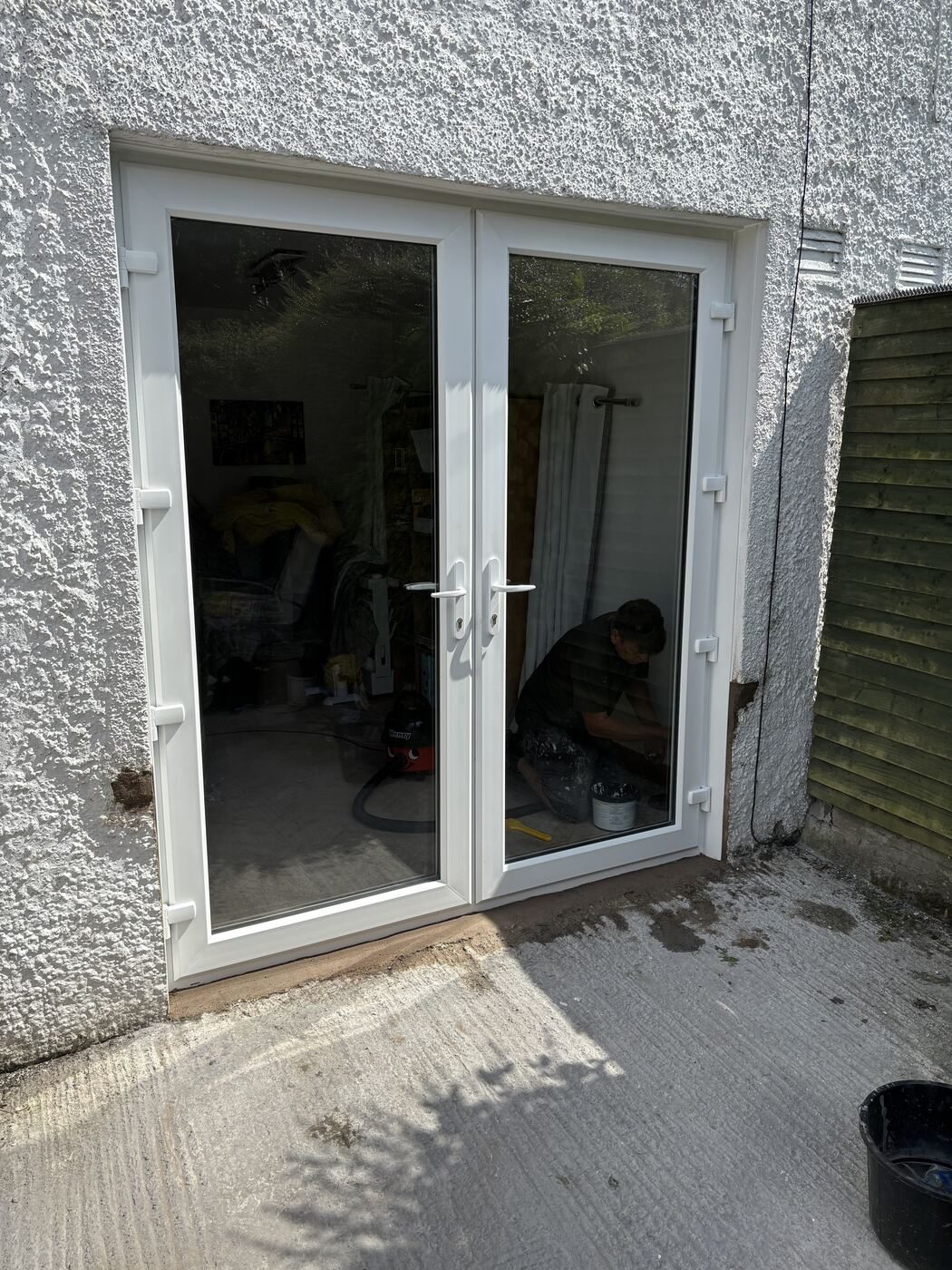 White uPVC French doors being fitted